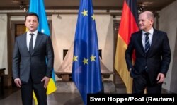 Olaf Scholz Münchenben találkozik Volodimir Zelenszkij ukrán elnökkel 2022. febuár 19-én