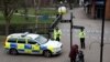 Britain - Police officers continue to guard the scene where a forensic tent in the centre of Salisbury