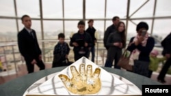 A gilded handprint of Kazakh President Nursultan Nazarbaev inside the 97-meter-high Baiterek Tower in Astana