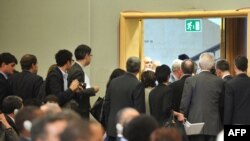 EU delegates leave the assembly room during Ahmadinejad's speech.