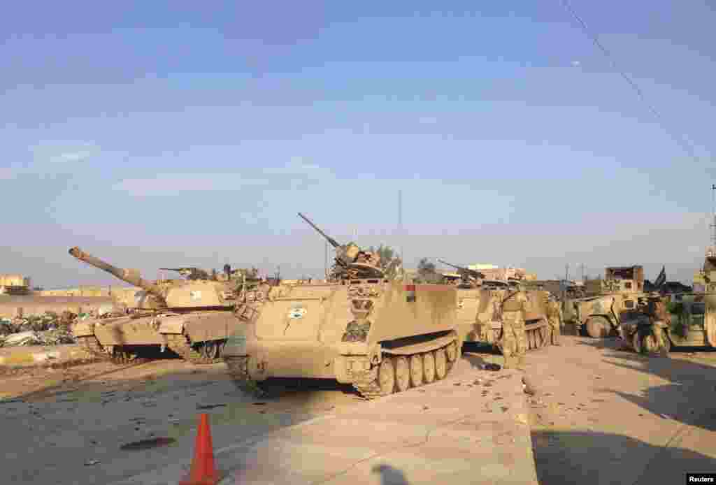 Iraqi security forces use tanks and heavily armored vehicles in the fight against the rebels.