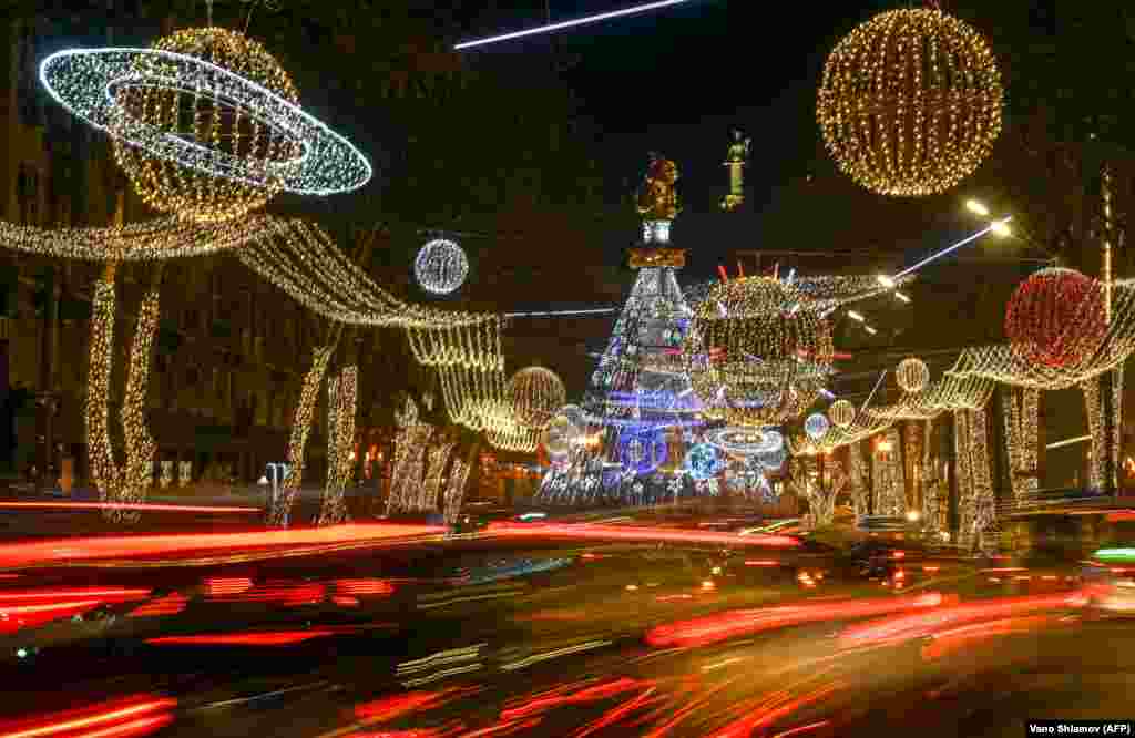 Christmas decorations adorn the streets of the Georgian capital, Tbilisi, late on December 24. (AFP/Vano Shlamov)