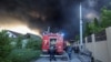 Тушение пожара после российского ракетного удара в Харькове, 4 мая 2024 года