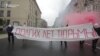 WATCH: Activists ran along a street in St. Petersburg with a banner wishing Russian President Vladimir Putin "many years in jail" on his birthday on October 7.