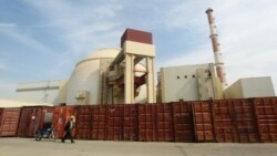 A worker walks past Iran's Bushehr nuclear power plant, some 1,200 kilometers south of Tehran. (file photo)