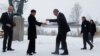 Russian Foreign Minister Sergei Lavrov is greeted by his Norwegian counterpart, Ine Marie Eriksen Soreide, in Kirkenes.