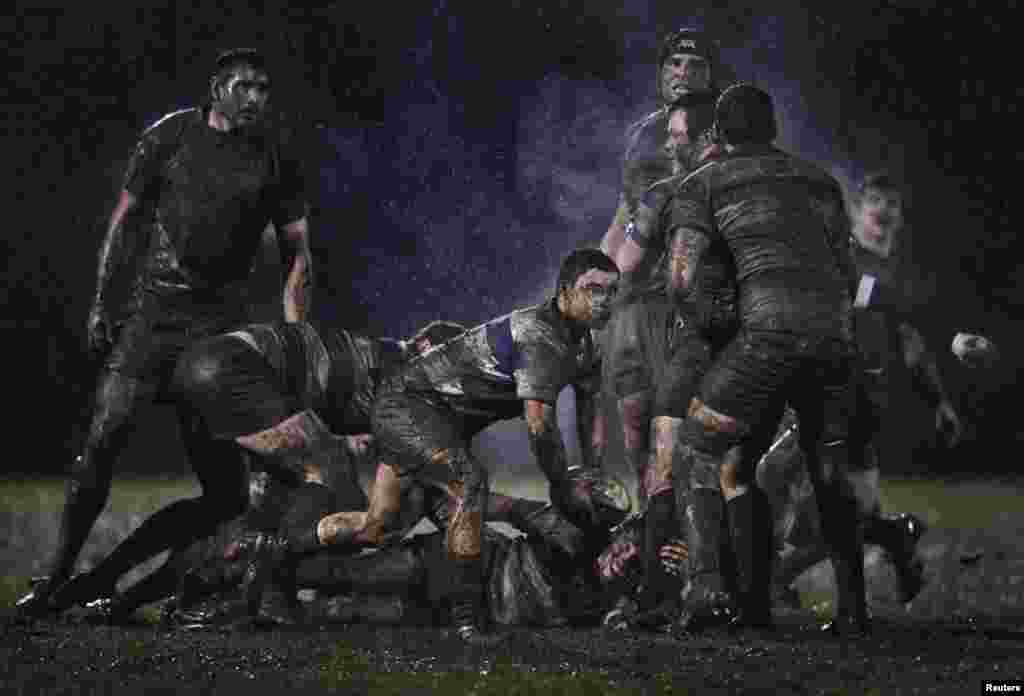 Ray McManus of Ireland captured this action picture during a rugby match between Old Belvedere and Blackrock, played in heavy rain in Dublin.