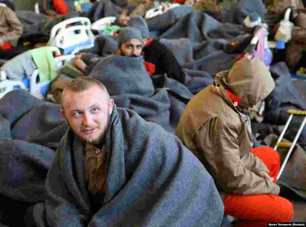 Alija Keserovic, a prisoner from Bosnia and Herzegovina, suspected of being part of the Islamic State, sits inside a prison hospital in Hasaka.&nbsp;