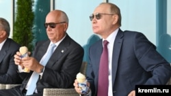 Sergei Chemezov and Vladimir Putin earlier this year