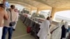 Ambulances line up outside of Riyadh's airport after a suspected Houthi missile strike on October 10.