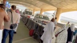Ambulances line up outside of Riyadh's airport after a suspected Houthi missile strike on October 10.