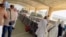 Ambulances line up outside of Riyadh's airport after a suspected Houthi missile strike on October 10.