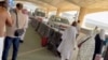Ambulances line up outside of Riyadh's airport after a suspected Houthi missile strike on October 10.