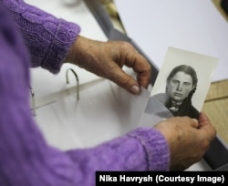 Halyna Stanytsina working in the Kyiv archive (Photo courtesy of Nika Havrysh)