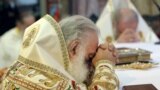 Greece -- Religious Orthodox Christians leaders pray inside a church in Heraklion on the Greek island of Crete, June 19, 2016