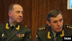 Russia -- General Valery Gerasimov (R), chief of the Russian General Staff, and Lieutenant General Igor Sergun, identified as head of the Russian military intelligence agency (GRU), May 3. 2012