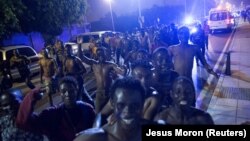 Мігранты з Афрыкі ў анкляве Сэўта, 7 жніўня 2017