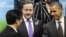 Barack Obama, Hu Jintao și David Cameron