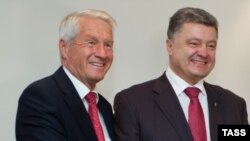 Генсекретар Ради Європи Торбйорн Яґланд (Л) і президент України Петро Порошенко (П). Архівне фото