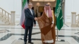Iran's Foreign Minister Abbas Araqchi (left) meets with Saudi Arabian Foreign Minister Prince Faisal bin Farhan Al Saud in Jeddah on May 10.