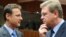 EU Enlargement Commissioner Stefan Fuele (right) speaks with Croatian Foreign Minister Gordan Jandrokovic before the seventh meeting of the EU-Croatia Stabilization and Association Council in Brussels on April 19.