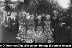Women and girls, possibly dressed to celebrate a wedding, in Ukraine's Pavlohrad Region in 1909