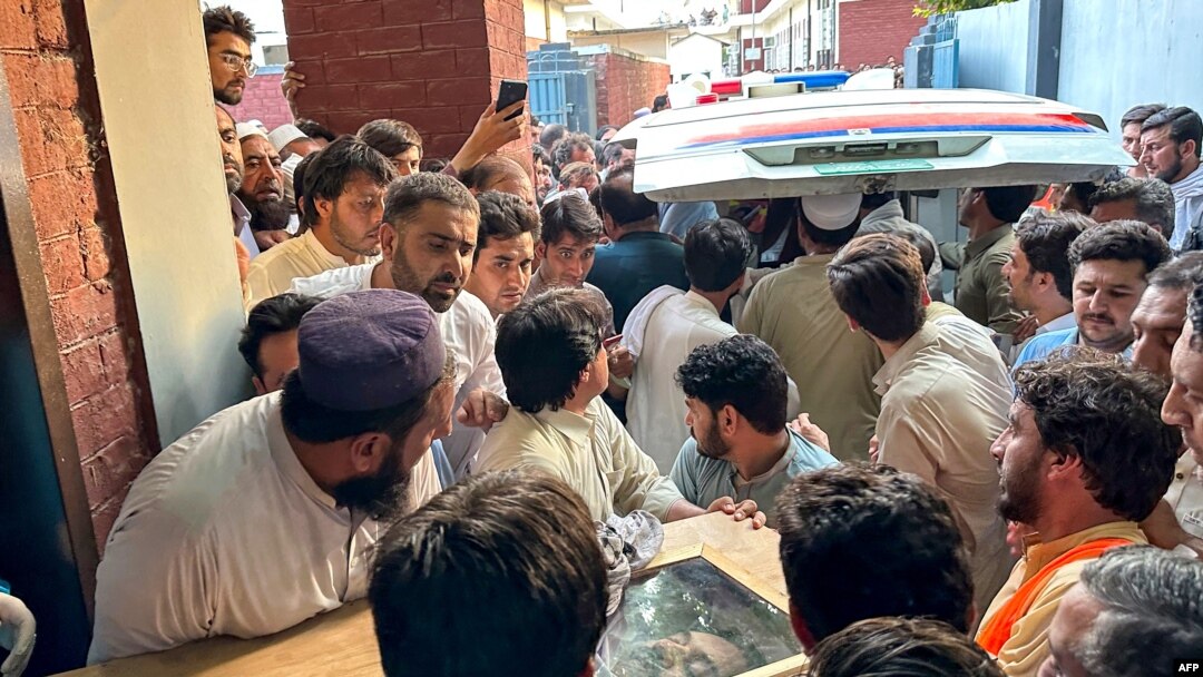 People carry the coffin of former Senator Hidayatullah Khan after he was killed in a bomb explosion in Bajaur district of Pakistan's Khyber Pakhtunkhwa Province on July 3. The region has seen an increase in deadly attacks in recent years.