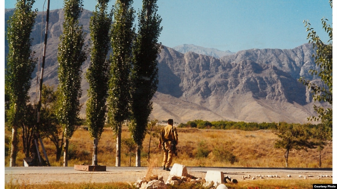 A Kyrgyz soldier stands guard in the Batken area in 1999. The country was ill-prepared for the onslaught of militant from Tajikistan.