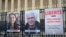 This photograph shows portraits of French national Cecile Kohler (left) and her partner French Jacques Paris, along with a placard calling for their release, Paris, March 25