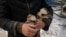 Two Kookaburra, a bird species native to Australia, being evacuated from a bomb-damaged aviary in the Feldman Ecopark. The private zoo near Kharkiv was hit by a Russian glide bomb on January 1. <br>