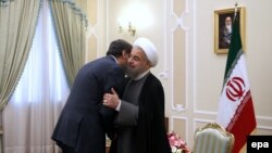 A handout picture made available by the Iranian presidential office shows Iranian president Hassan Rouhani greeting Ramadan Abdullah Shalah (L), Secretary General of the Palestinian Islamic Jihad (PIJ), in Tehran, 05 May 2016.