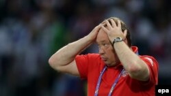 Russia's coach Leonid Slutsky reacts during a Euro 2016 preliminary round match between Russia and Slovakia