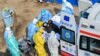 China -- Medical staff transfer patients to the newly completed Huoshenshan temporary field Hospital in Wuhan, Hubei Province, February 4, 2020