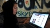 Afghanistan -- An Afghan ethnic Hazara woman browses the Facebook website at the Young Women For Change internet cafe, Afghanistan's first women-only net cafe, in Kabul, July 22, 2012 