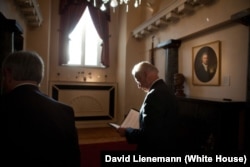 Biden reads over his speech on U.S.-Russia relations before an event at Moscow State University on March 10, 2011.