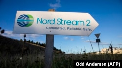 A road sign directs traffic towards the Nord Stream 2 landfall facility entrance in Lubmin, northeastern Germany.