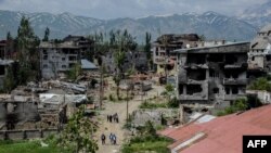 Turkey -- This file photo taken on May 30, 2016 shows a general view of damaged buildings following heavy fightings between government troops and Kurdish fighters.