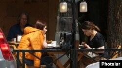 Armenia -- Customers at a cafe in Yerevan, May 4, 2020.