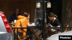 Customers in an outdoor cafe in Yerevan (file photo)