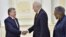 Uzbek President Shavkat Mirziyoyev (left) meets with U.S. Undersecretary of State Thomas Shannon (center) in Tashkent on March 26.