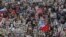 People carry pictures of World War II soldiers as they take part in the Immortal Regiment march during the Victory Day celebrations in central St. Petersburg on May 9.