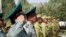 Tajik guards stand at attention during the official opening of a new Tajik-Afghan border post, which has been funded by the U.S. State Department. (courtesy of the Bureau of International Narcotics and Law Enforcement Affairs - U.S. State Dept.)