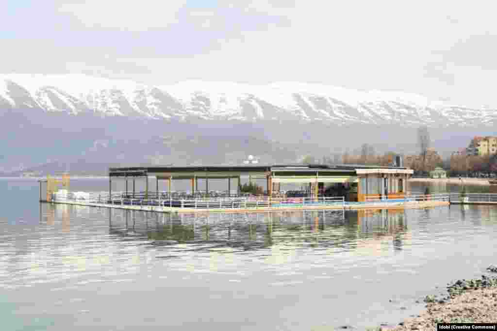 A floating restaurant on the Albanian side of Lake Ohrid &nbsp; UNESCO cited pollution, &ldquo;extensive uncontrolled urban development&rdquo; through illegal construction projects, and &ldquo;inappropriate exploitation of the coastal zones.&rdquo;