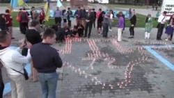 В Херсоне свечами выложили силуэт Крымского полуострова (видео)