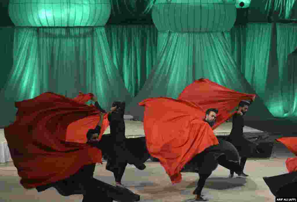 Pakistani artists perform a Sufi dance during the Mystic Music Sufi Festival in Lahore. (AFP/Arif Ali)