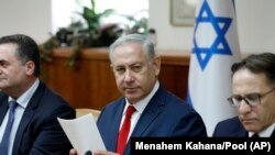 Israeli Prime Minister Benjamin Netanyahu chairs the weekly cabinet meeting at his office in Jerusalem, Sunday, May 27, 2018.