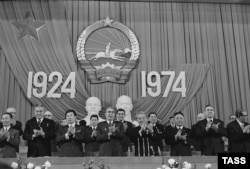 Soviet leader Leonid Brezhnev (center left) marks 50 years of the Mongolian People's Republic alongside Mongolia's communist leader Yumjaagiin Tsedenbal (center right) in Ulan Bator on November 1, 1974.