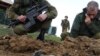 ISRAEL, WESTERN GALILEE : ISRAEL OUT Israeli soldiers examine the remains of a rocket fired from Lebanon and landed near a private residence in the western Galilee, near the northern Israeli town of Maalot, on February 21, 2009.