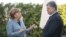 German Chancellor Angela Merkel (left) and Ukrainian President Petro Poroshenko talk during a meeting in Berlin on April 10.