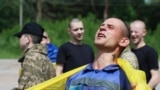 Мекенине кайтарылган украиналык согуш туткуну. 9-июнь 2025-жыл (Сүрөт тартылган аймактын аталышы ачыкка чыгарылган жок) 